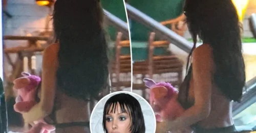 Bianca Censori protege su atuendo casi imperceptible con un osito de peluche durante una salida en Los Ángeles