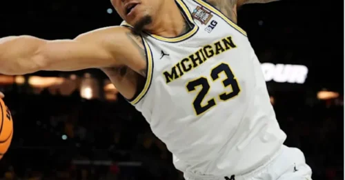 7-foot-4 wingspan. That’s NOT a typo. Michigan’s TITLE hero is coming to Chicago to BREAK the league. And NOBODY is ready.